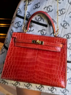 Hermès Kelly 25 Sellier Geranium Shiny Alligator Gold Hardware
