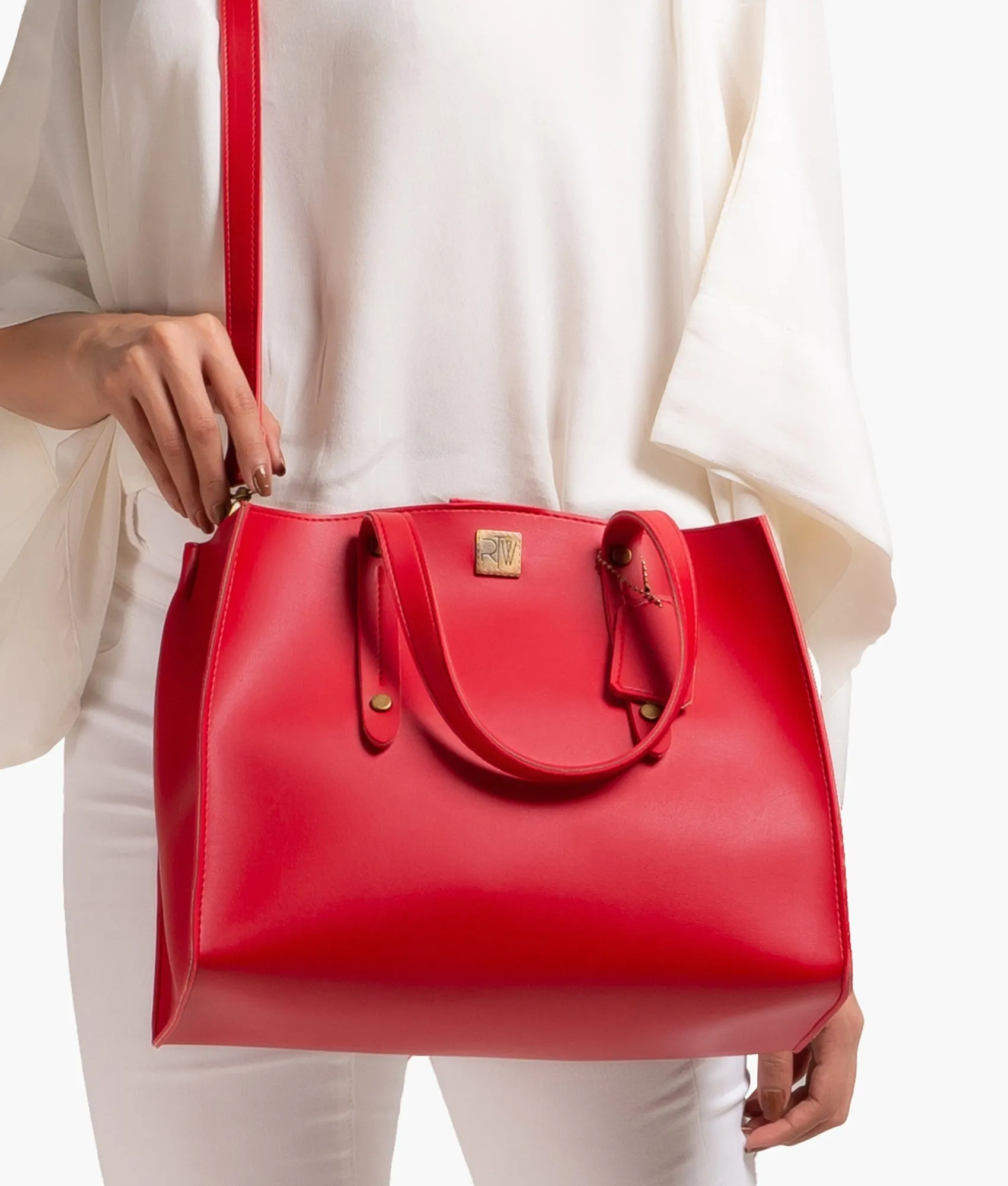 Red multi compartment satchel bag