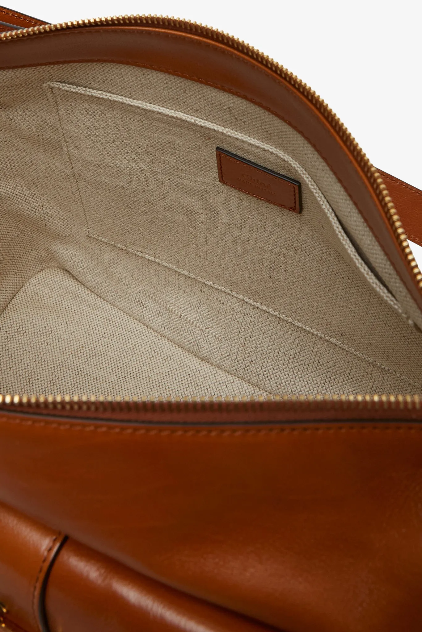 Shiny brown camera bag