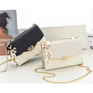 Veloria™ Compact Messenger Satchel